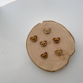 تصویر دکمه خرسی چوبی 