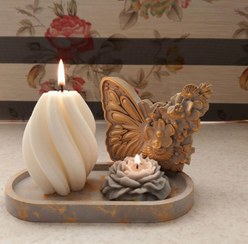 تصویر ست دکوری سنگ مصنوعی و شمع تزئینی مدل گل و پروانه 