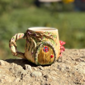 تصویر ماگ کلبه ای 