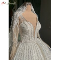 تصویر لباس عروس مدل بانو آستین توری پرکار 