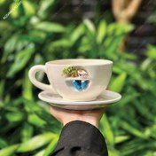 تصویر ماگ سرامیکی طرح کتابخانه با نعلبکی 