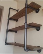 تصویر قفسه دیوارکوب لوله ای و چوبی لوله آب 