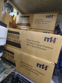 تصویر دوک خیاطی سفید 