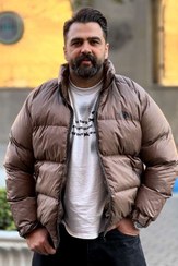 تصویر کاپشن پفی یقه ایستاده نورث فیس(the north face) - بوتیک ماکان 