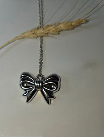 تصویر گردنبند استیل پاپیون 
