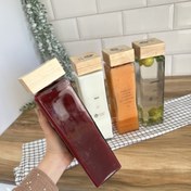 تصویر بطری آب چهارگوش درب مکعبی 