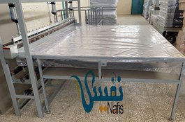 تصویر دستگاه نیمه اتوماتیک بسته بندی تشک 