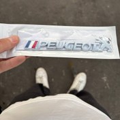 تصویر آرم پژو فلزی طرح دار 