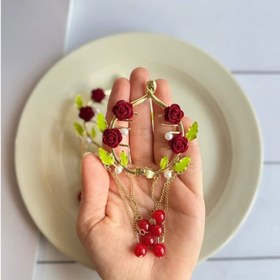 تصویر گیره گوجه ای آویزدار 