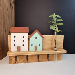 تصویر جاکلیدی مینیمال کلبه و گلدان دلسی وود 