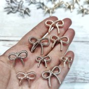 تصویر دکمه دفرمه طرح پاپیون باریک(چهار سایز) 