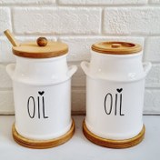 تصویر بانکه روغن جامد سرامیکی با قاشق چوبی 