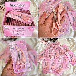 تصویر قیچی ابرو شانه دار به همراه تیغ اصلاح مخصوص 