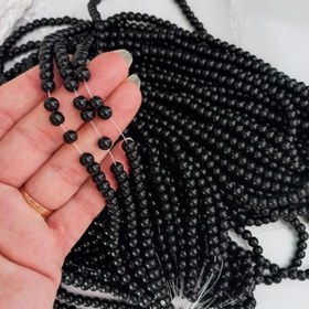 تصویر مروارید سنگی رنگ مشکی ،سایز6،بصورت ریسه ای 144 عددی 