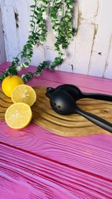 تصویر آبلیموگیری دستی مشکی Black manual lemon squeezer