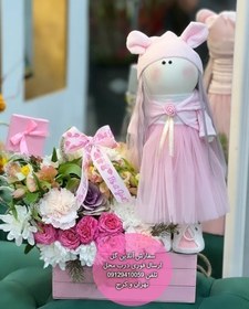 تصویر دسته گل و کیک برای تبریک زایمان سزارین با گل آفتابگردان 