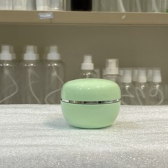 تصویر پوکه ظرف قوطی کرم 