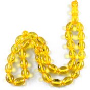 تصویر تسبیح پودر کهربا ۳۳ دانه زرد با عطر لیمو و حشره دار 