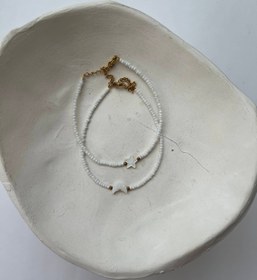 تصویر پابند منجوق پلاک دار 