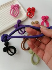 تصویر کش مو گره ای رنگی 