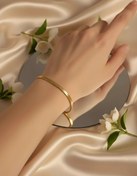 تصویر دستبند ماری طلایی زنانه استیل رنگ ثابت همراه با زنجیر سایز 