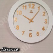 تصویر ساعت دیواری صفحه تمام چوب مارال 