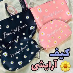 تصویر کیف آرایش ویکتوریا سکرت طرح گل بابونه ۳ تکه صورتی 