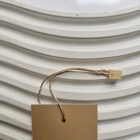 تصویر نخ پلمپ کرمی 