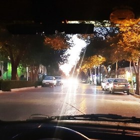 تصویر آفتابگیر خودرو تک لنز زردرنگ شفاف 