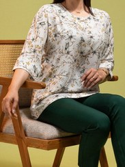 تصویر بلوز زنانه سایز بزرگ کرپ طرح دار یقه گرد آستین سه ربع ملیکا 