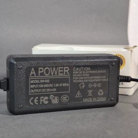 تصویر آداپتور رومیزی ۱۲ ولت ۲ آمپر A POWER 