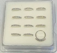 تصویر پیرسینگ بینی حلقه‌ای شش نگین‌ 