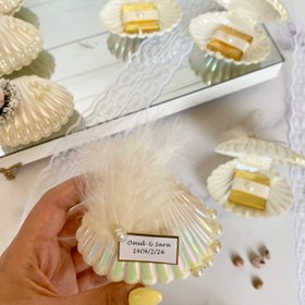 تصویر صدف مرواریدی یه هدیه‌ی رویایی از دل دریا، با طعم شکلات و برق مروارید