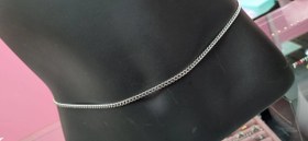 تصویر زنجیر بدن استیل دور کمر کارتیر 