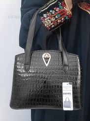 تصویر کیف زنانه دوشی ورنی مدل اشکی 