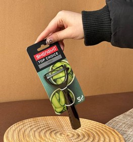 تصویر پوست کن شنگیا مشکی 