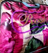 تصویر پتو تک نفره گلبافت طرح شادیلون ساکدار 