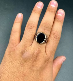 تصویر انگشتر طلاروس طرح بیضی مشکی 