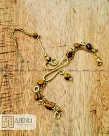 تصویر تمیمه سنگ عقیق چشم ببر 