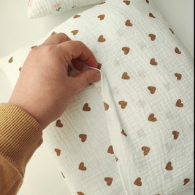 تصویر بالش نوزاد موسلین 