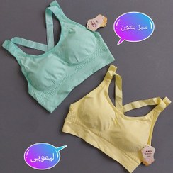 تصویر نیم‌تنه ورزشی زنانه پشت ضربدری فری سایز با پد متحرک سبز 