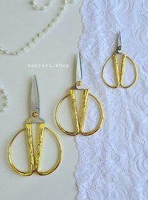 تصویر قیچی آنتیک سرنخ زن 