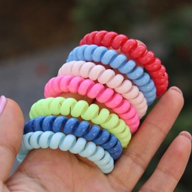 تصویر کش مو و دستبند سیم تلفن رنگی 