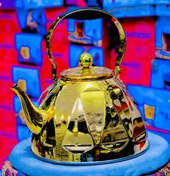 تصویر کتری طلایی طرح الماسی کف چودن 