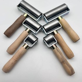 تصویر غلطک چسب فولادی دسته چوبی 