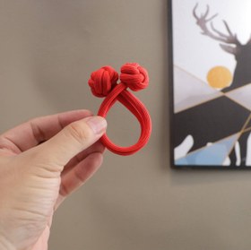 تصویر کش مو گره ای - قرمز 