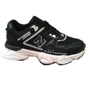 تصویر کفش کتانی نیو بالانس مشکی و سفید با بند هدیه 