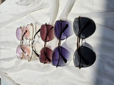 تصویر عینک آفتابی طرح گربه‌ای 