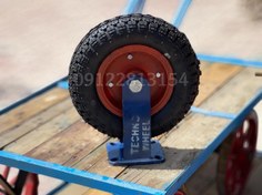 تصویر چرخ فرغونی بادی ثابت رینگ چدنی 