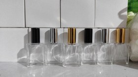 تصویر شیشه عطر 15میل مکعبی(1جین 12عددی) 